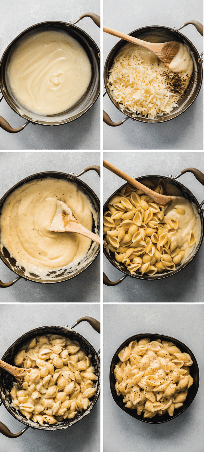 Cauliflower purée, shredded cheddar cheese, and shell pasta being stirred together in a large pot.